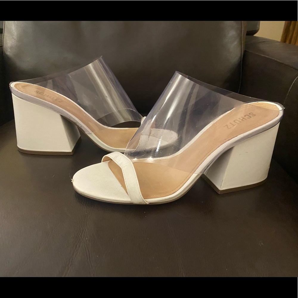 Thick heel with clear top. Lightly worn.